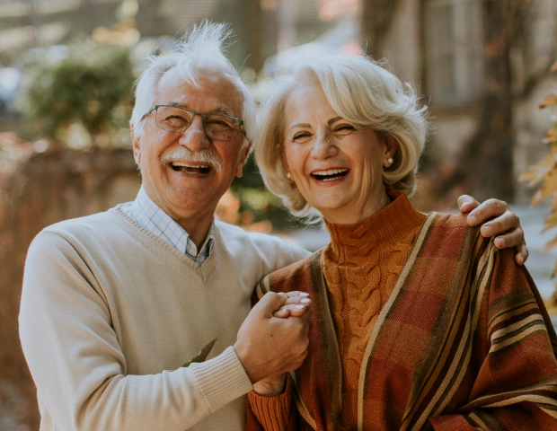 Senior couple reviewing dental insurance benefits